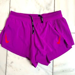 Purple Nike running shorts